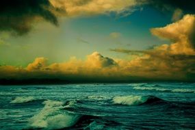 waves on the blue ocean at dusk