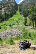 Backpack on Trail at Mountains