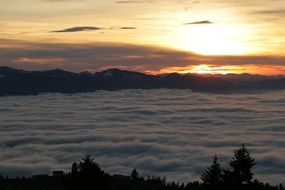 clouds over the austrian alps