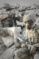 military in the desert in position