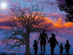 silhouettes of family on a background of mystical sunset