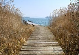 Wooden boardwalk to the beach
