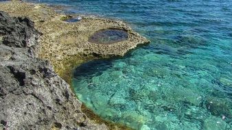 crystal blue water by the cape greco