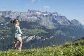 girl on the swiss mountains background