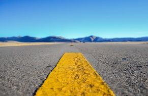 yellow markings on a highway close up