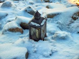 vintage frozen Lantern on snow