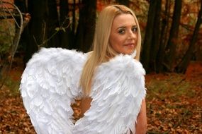 blonde Girl with Angel Wings autumn view