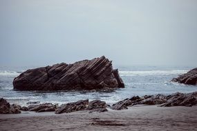 Landscape with Rocks in sea at beach