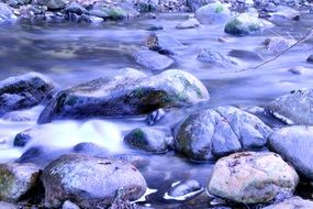 stones in the river in the cold