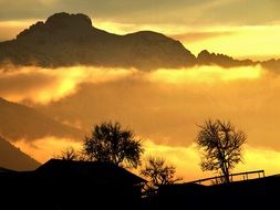 mountain peaks reach the clouds