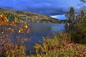 scenic Autumn Landscape beneath stormy clouds, canada, quÃ©bec