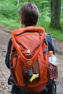 Photo of human with hiking backpack