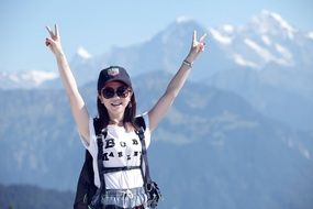 happy girl after climbing the mountain