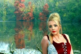 Picture of the Girl is on a lake beach