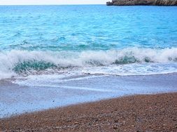 waves on the pebble beach in Mallorca