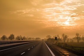 sunset over highway in italy