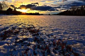 bright sunset over winter landscape