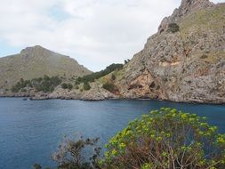 panoramic view of the Tramuntana mountain range along the sea bay