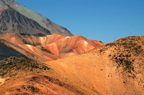 picturesque red and grey Mountains at blue sky, Peru, Andes