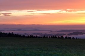 fog and pink sunset over Lake Constance