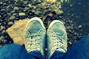 White sneakers on feet