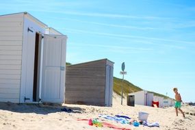 child walking in Domburg Beach scene