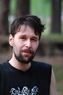 portrait of a young man in the forest