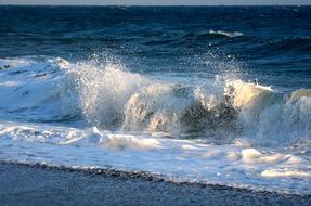 Wavy mediterranean sea at dusk