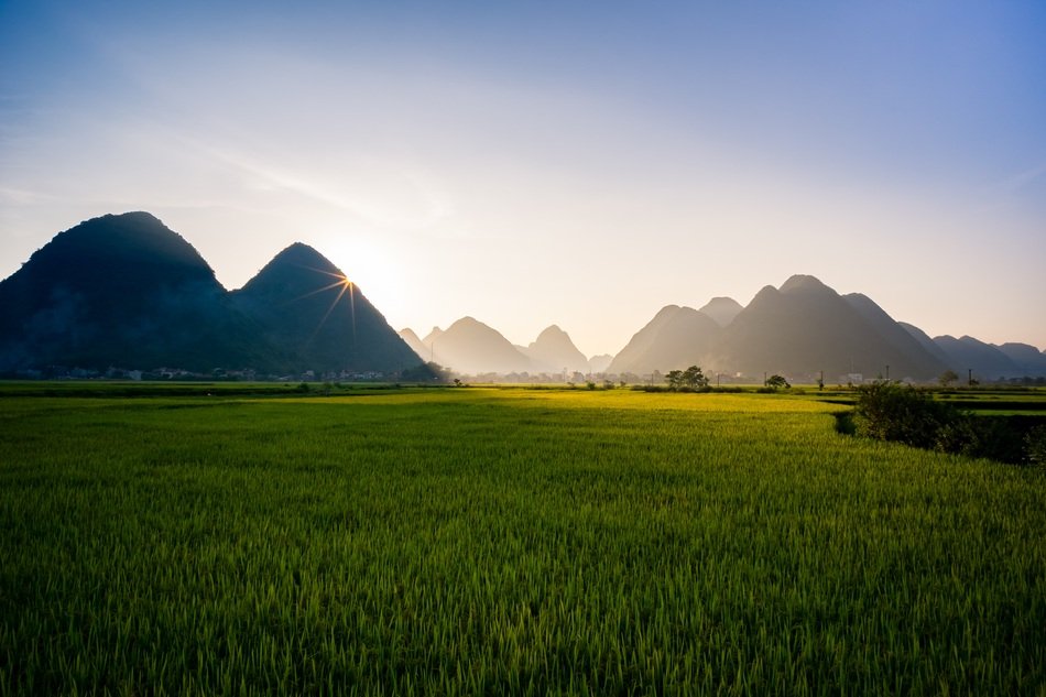 beyond the green meadow of the mountain
