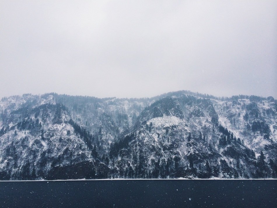 snow hills on the shoreline