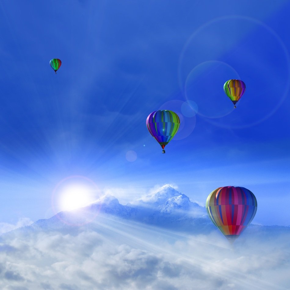 beautiful bright hot air balloons above the clouds