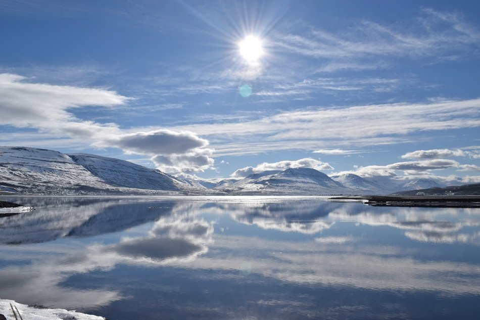 sun over the lake in winter