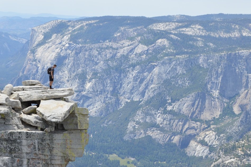 hiker on the edge of rock