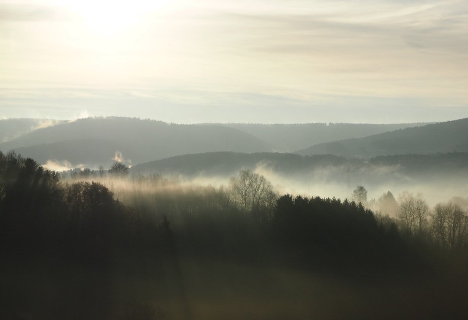sunrise over the hills with fog