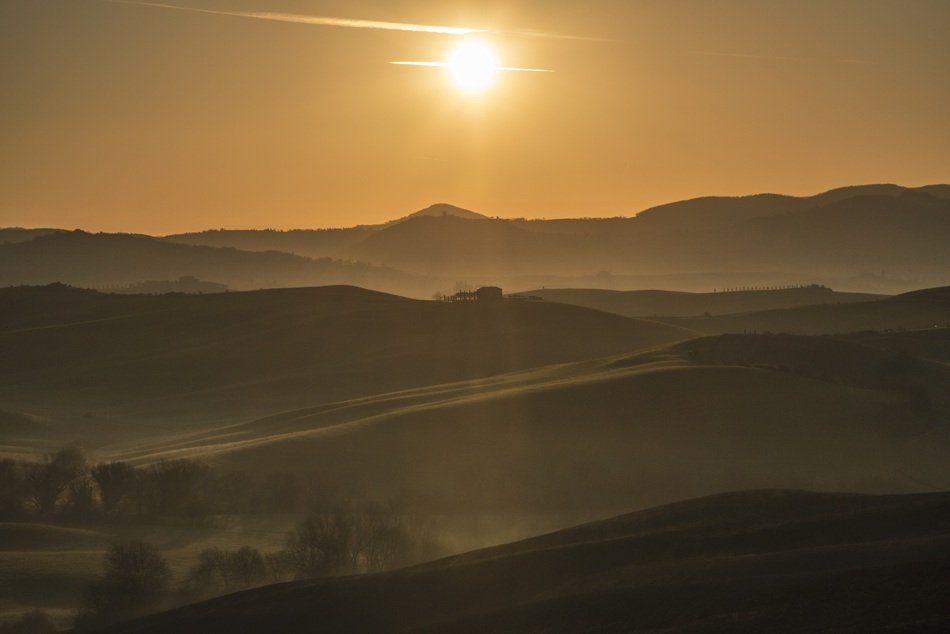sunset over the mountains in Tuscany