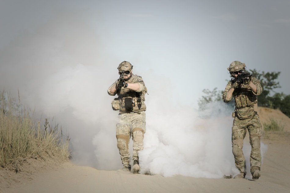 military in smoke in the desert