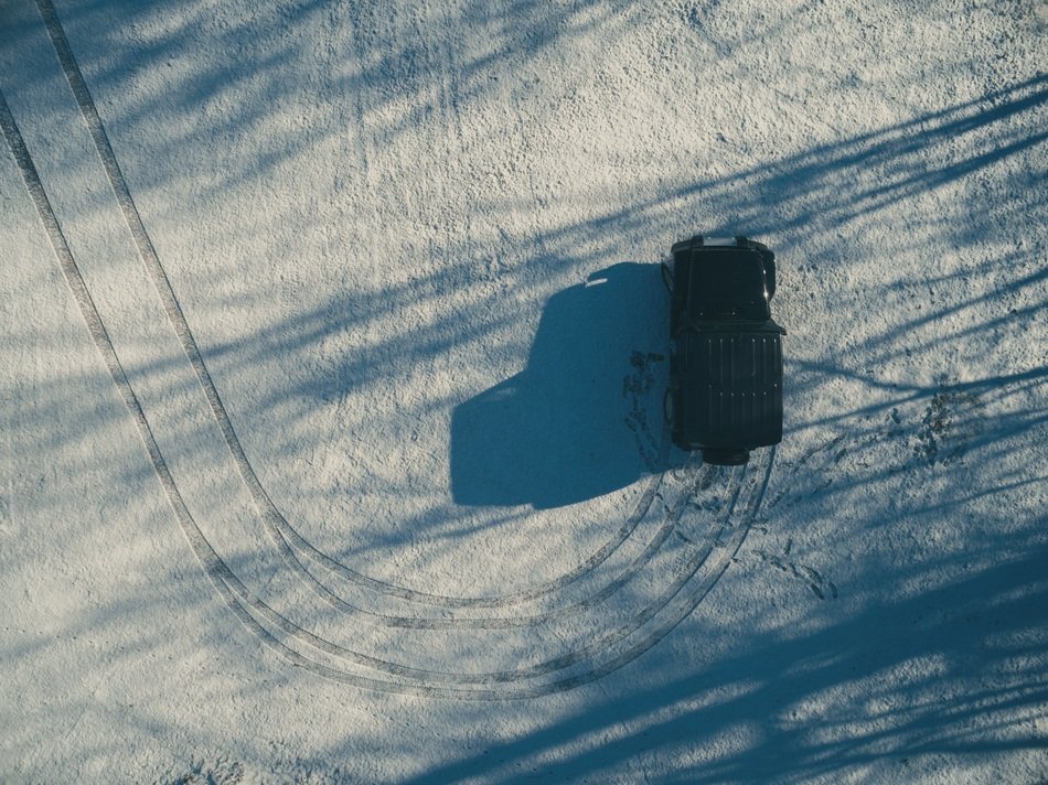 view of the car in the snow from above