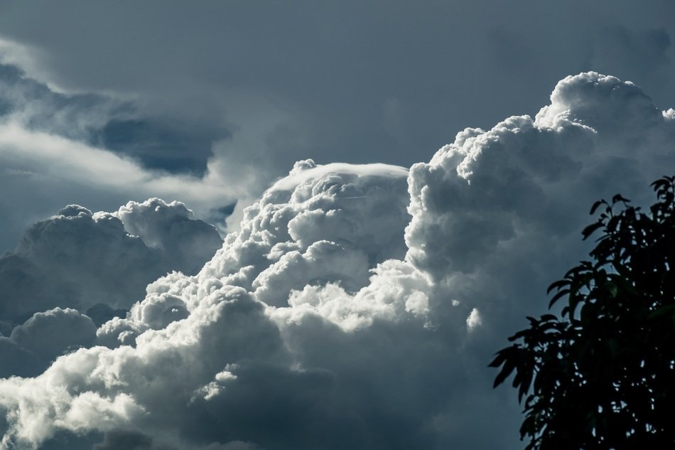 sunlight through huge cumulus clouds
