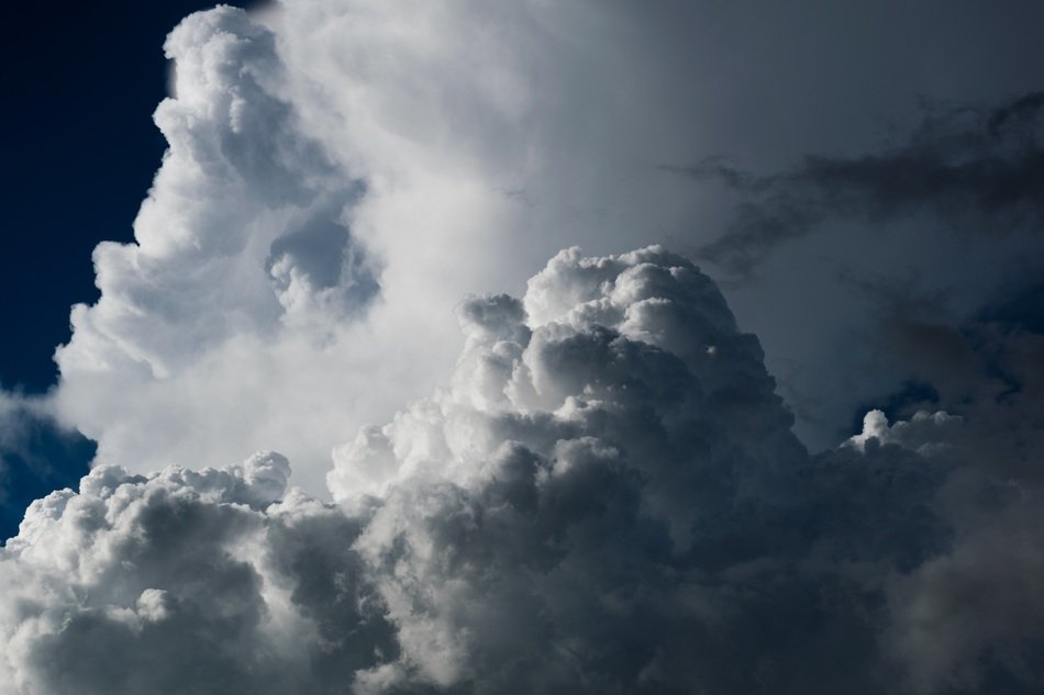 huge cumulus clouds in the sunlight