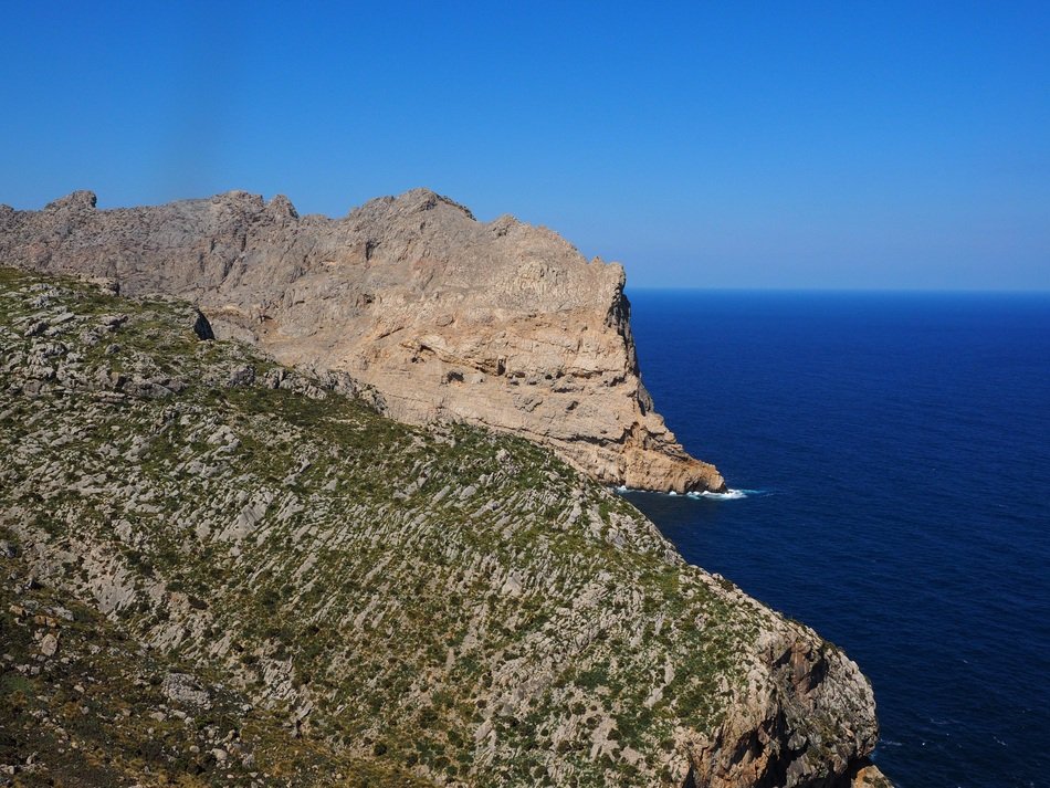 cliff on the coast of majorca on a sunny day