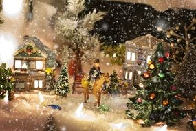 Beautiful, colored drawing of a Christmas village with decorations and Christmas Tree