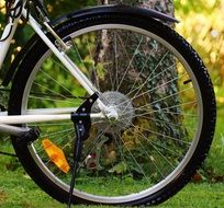 Rear wheel of bicycle close-up on blurred background