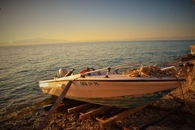 boat in the evening sun on the beach