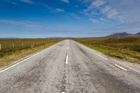 Landscape of long road in Scotland