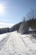 landscape of road in the snow to the Beskydy