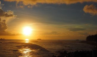 gorgeous Sunset above sea waves