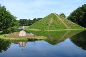 Green Pyramid on a lake