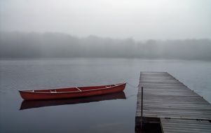 boat in Lake with romantic mist