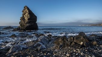 rocky beach on the costa del sol at sunrise