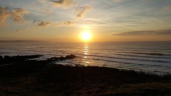 peaceful sunset over the ocean at dusk
